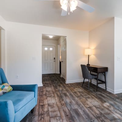 A furnished living area in a home at Santo Terrace in San Diego, California