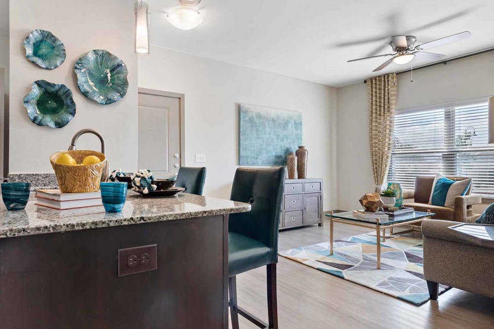 Spacious living room and kitchen at The Residences at Panther Hollow in Marble Falls, Texas