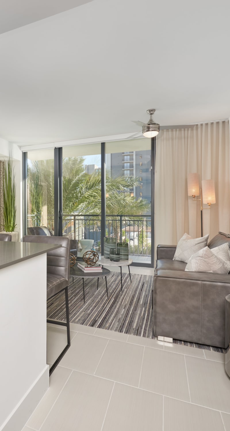 Modern livingroom with a large area rug at ParkLine Miami in Miami, Florida