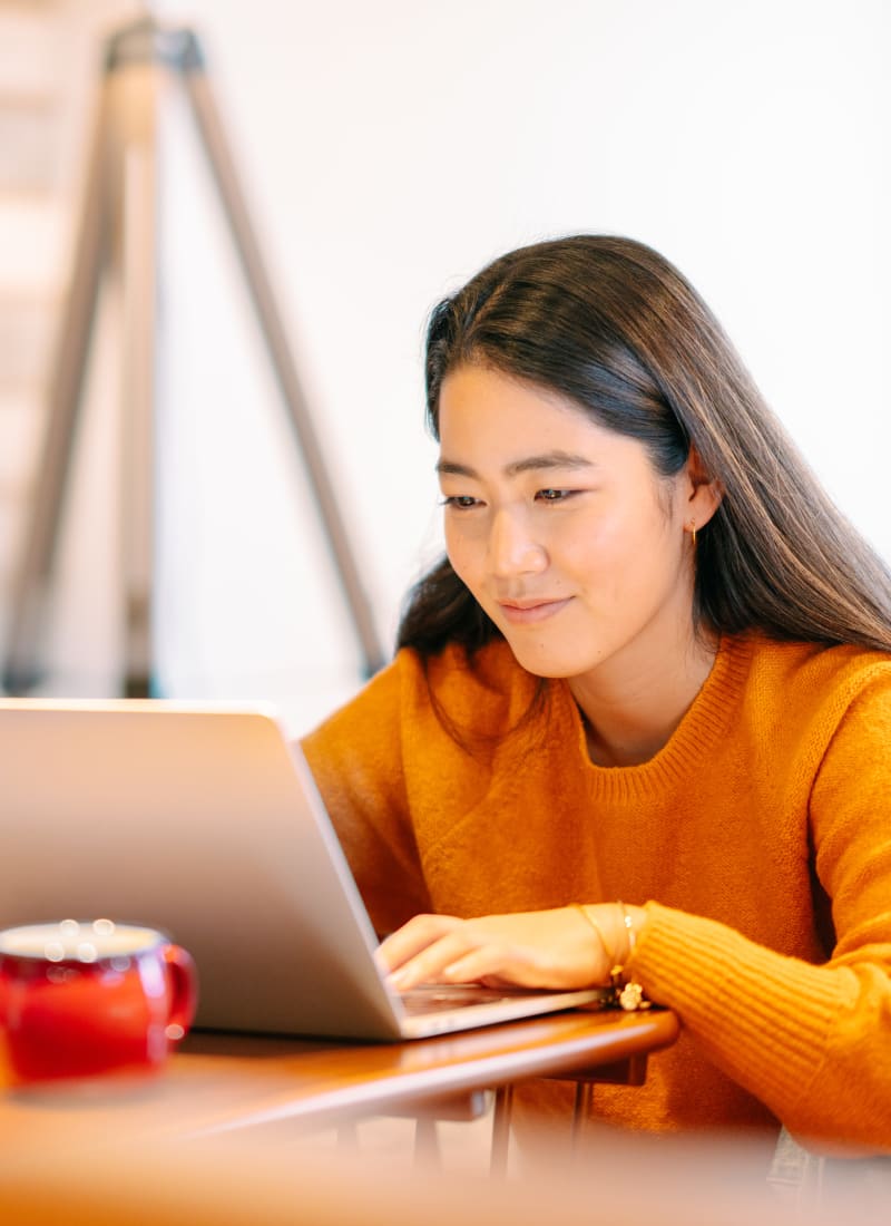 Resident studying in a café near Houston, Texas from Marquis on Memorial