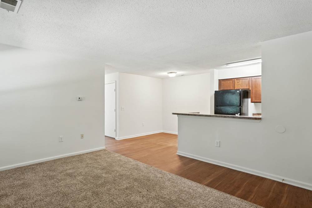 Open room with carpet flooring at Monmouth Woods in King George,Virginia