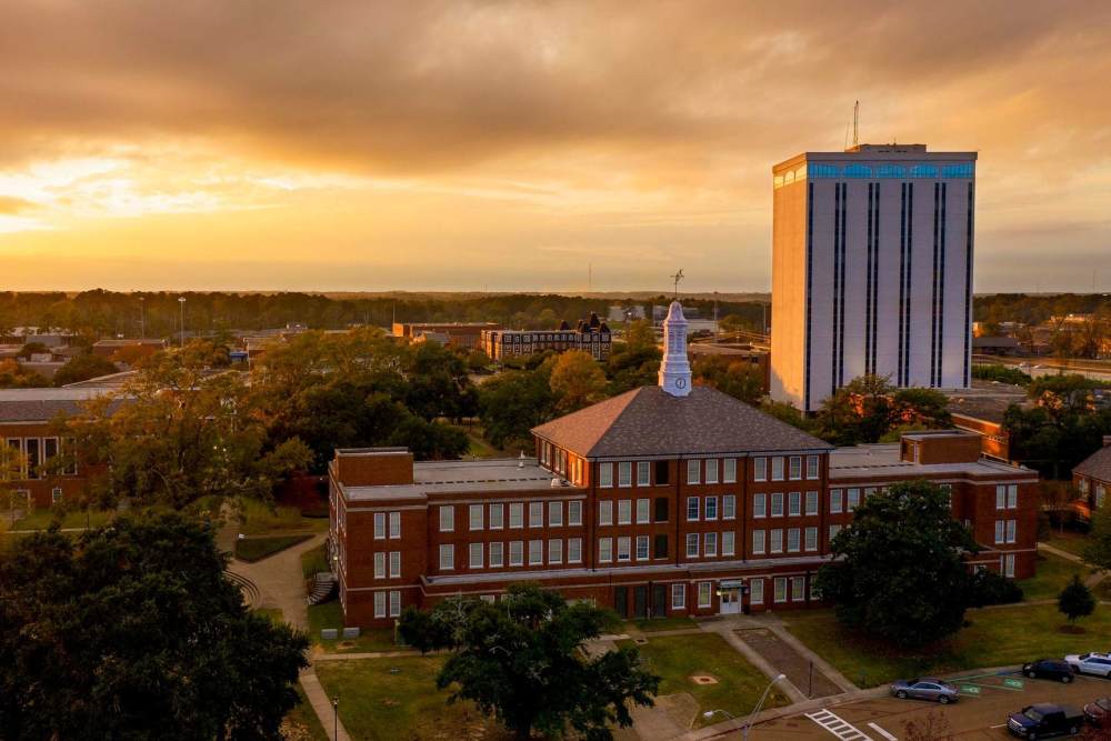 Sunset over city skyline at Russ Town Crossing in Ruston, Louisiana