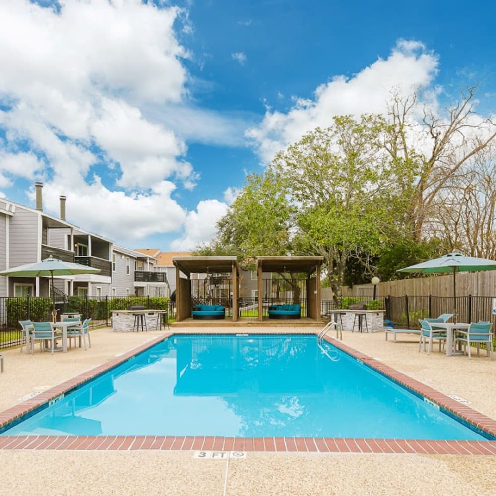 Inviting swimming pool and cabanas at Silvermine in Victoria, Texas