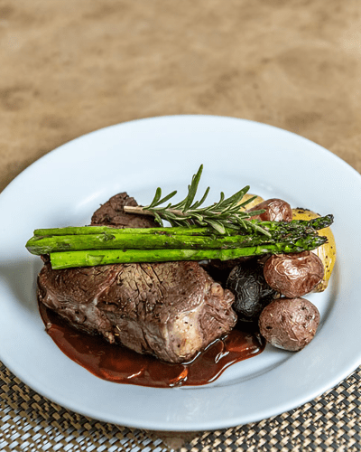 Delicious plate of steak, potatoes, and asparagus at The Views at Lake Havasu in Lake Havasu City, Arizona