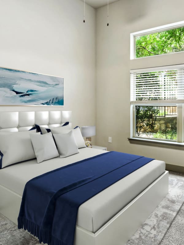 Brightly lit bedroom at Lantower Legacy Lakes in Lewisville, Texas