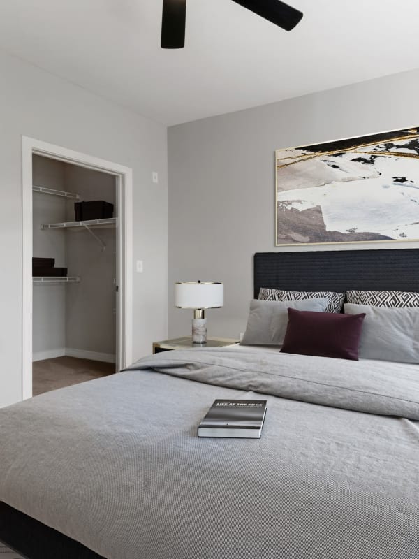 Bedroom with ceiling fan at Realm at Patterson Place in Durham, North Carolina