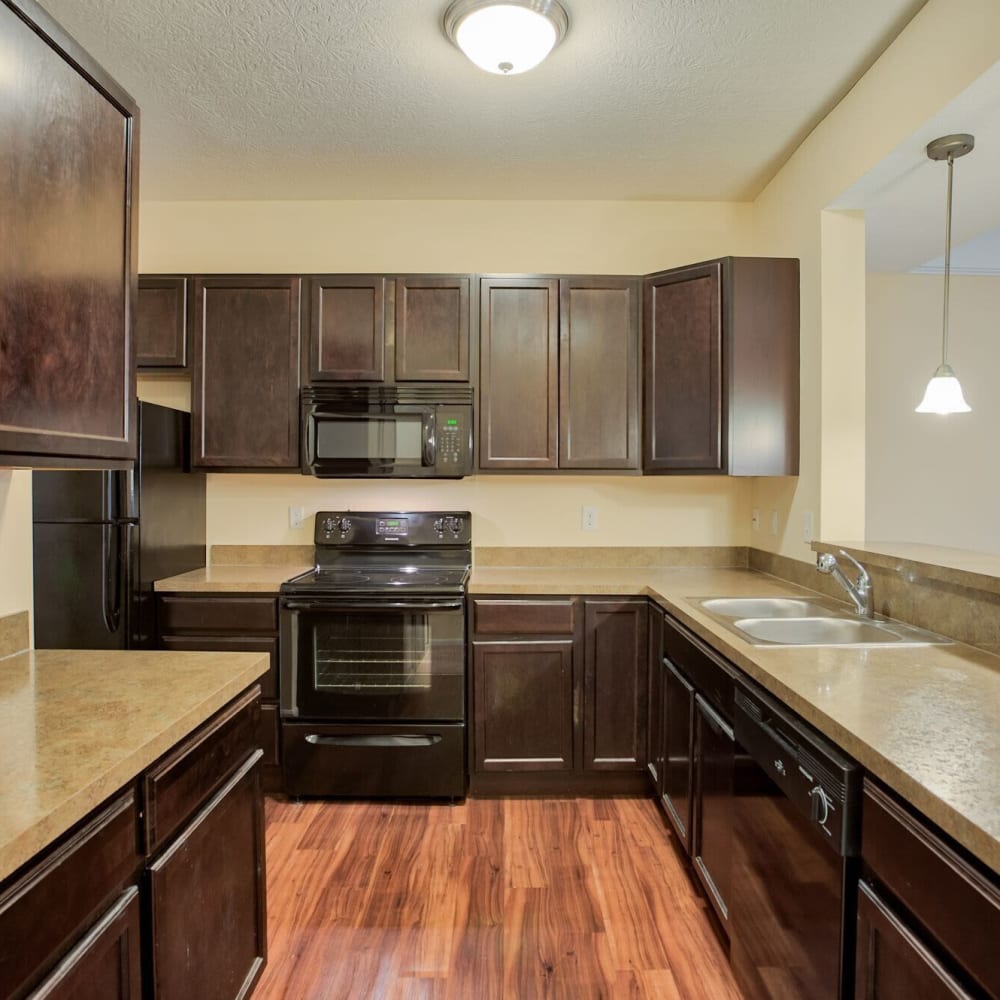 Kitchen with wood-style floor at Lancaster Midtown, Lancaster, Ohio