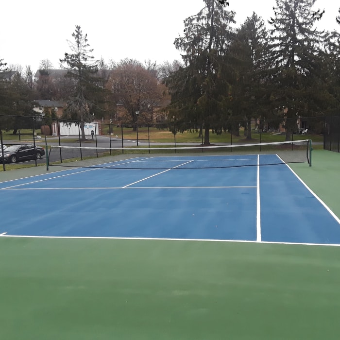 Tennis court offered at The Fairways Apartments and Townhomes In Thorndale, PA
