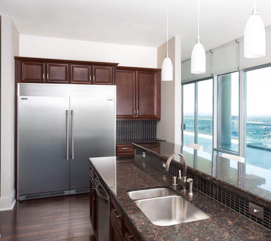 Kitchen with beautiful large windows at The Heights at Park Lane