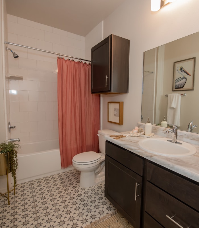 Bathroom with tile flooring at Artisan Crossing in Norman, Oklahoma