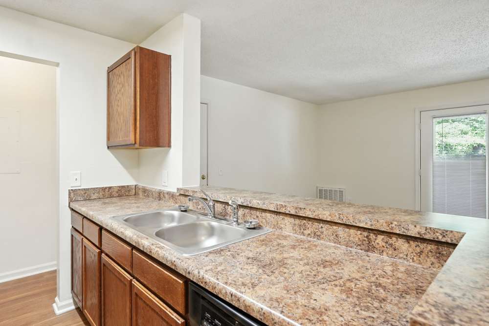 Kitchen with stainless-steel sink at Monmouth Woods in King George,Virginia