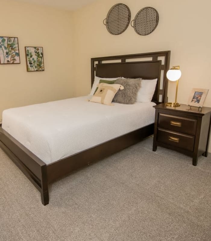 Chic bedroom at Sugarberry Apartments in Tulsa, Oklahoma