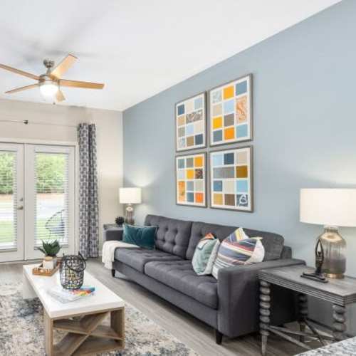 Well-furnished living area at Palmetto Exchange in Ladson, South Carolina