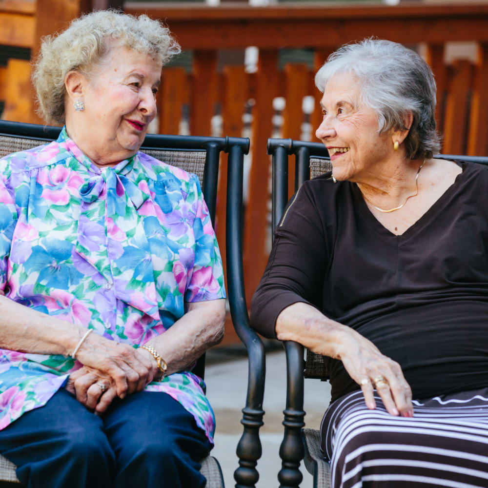 Two residents chatting at The Springs at Missoula in Missoula, Montana