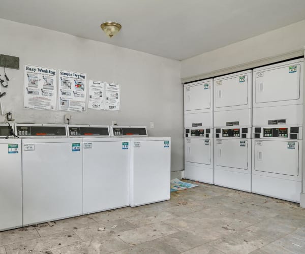 Washers and dryers in the laundry room at Stanton View Apartments in Atlanta, Georgia