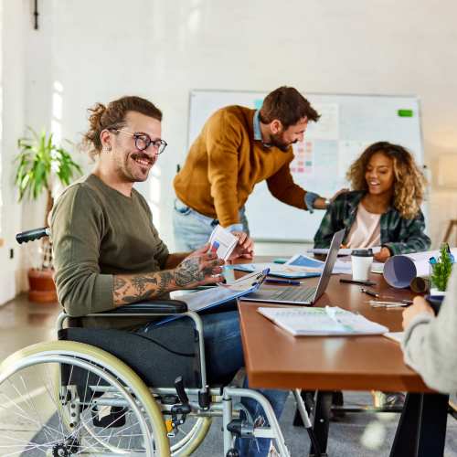Resident in wheelchair at work near Madrid Apartments in Mission Viejo, California