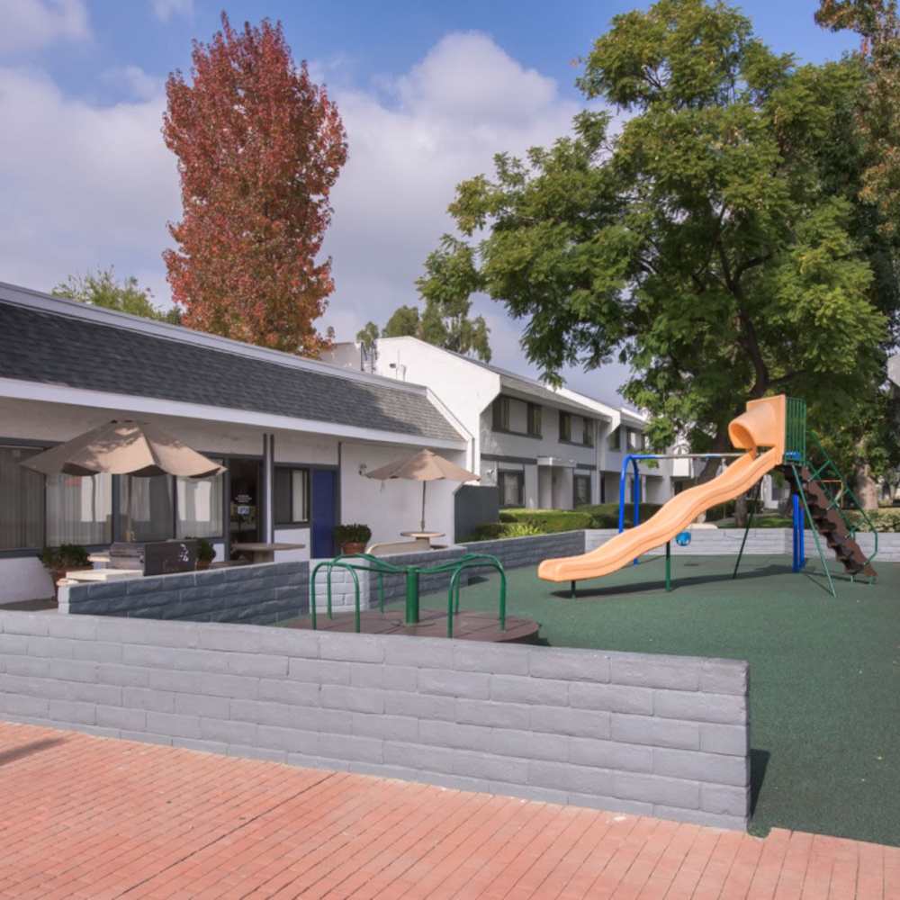 Kids playground with apartment at Fairvalley Villa in Covina, California  