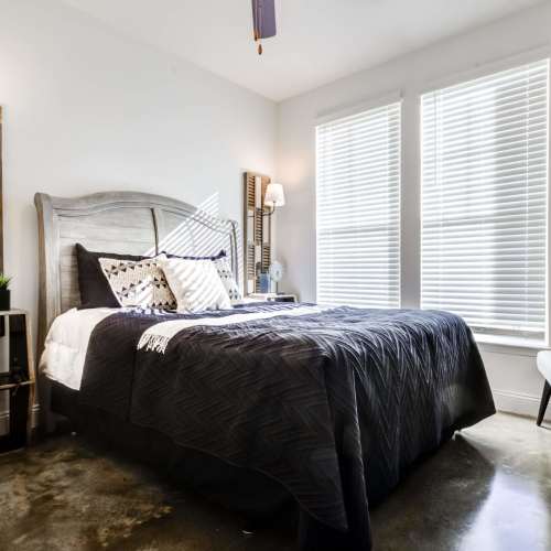 Comfortable bedroom with king size bed at Magnolia South in Holly Springs, North Carolina