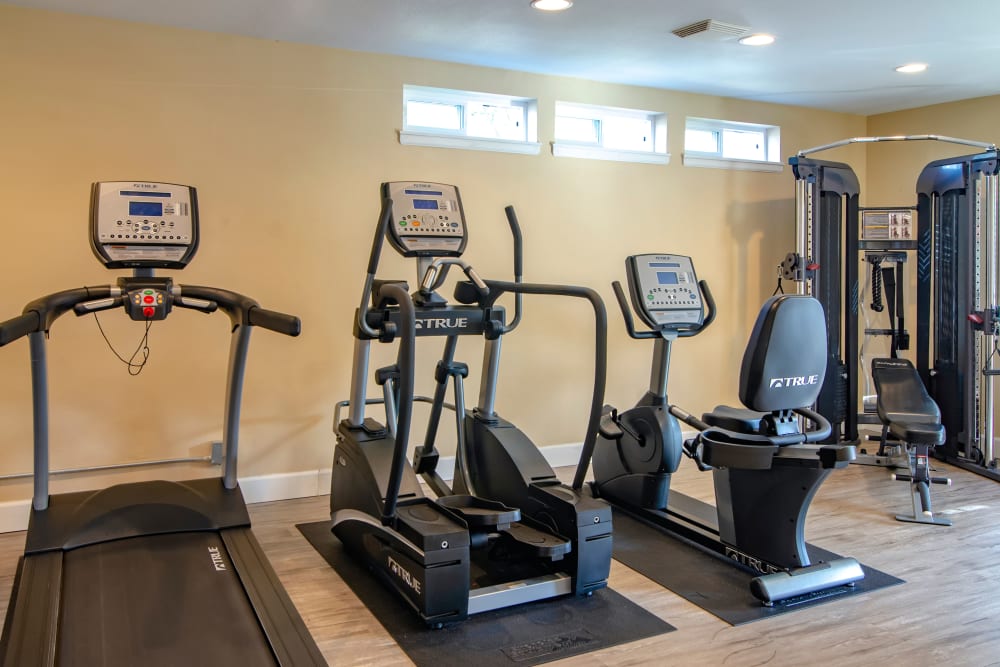 Fitness center with plenty of individual workout stations at The Addison Apartments in Vancouver, Washington