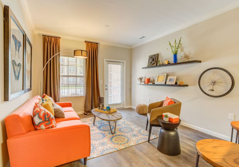 Large windows in living area at Bacarra Apartments in Raleigh, North Carolina