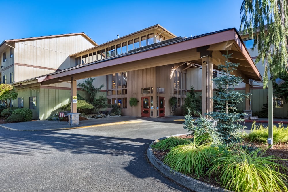 Grand front covered entrance at The Firs in Olympia, Washington