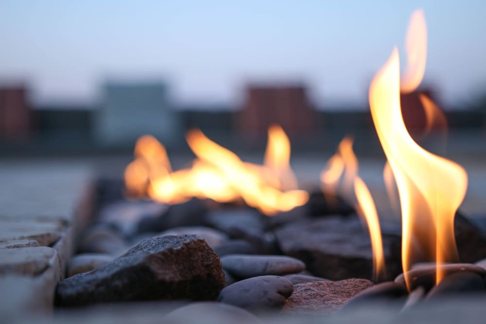 An outdoor firepit at One90 Main in Rowlett, Texas