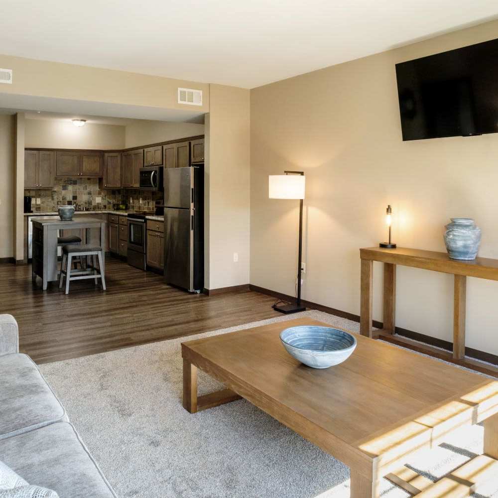 Livinig room with closet access to kitchen at InterUrban Apartments in Billings, Montana