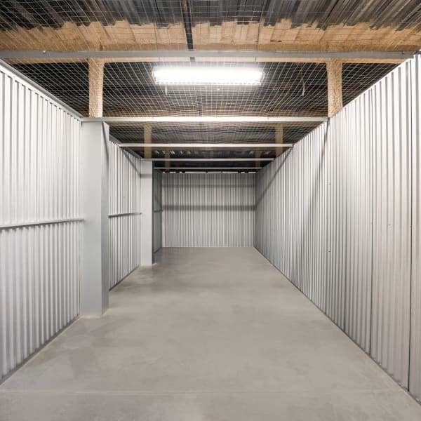 Inside a large climate controlled storage unit at StorQuest Self Storage in North Miami, Florida