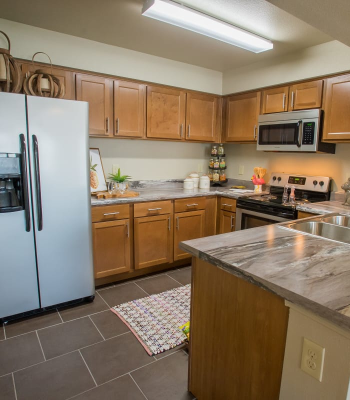 Kitchen with granite countertops at Tuscany Ranch in Waco, Texas