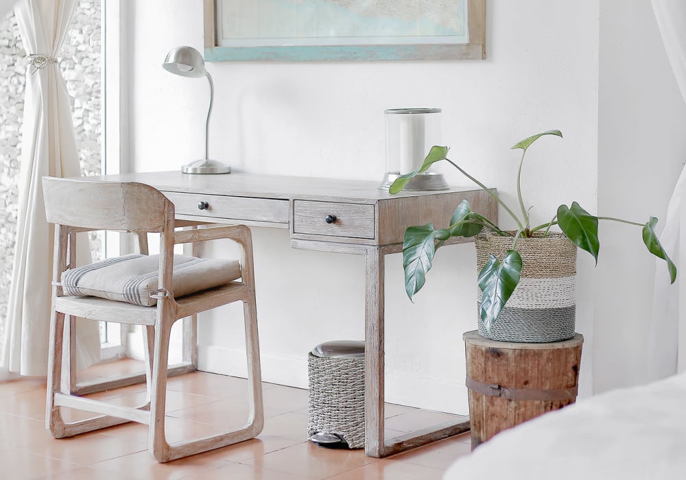 Workspace with a desk and chair in a minimal designed bedroom at Everwood at The Avenue in Murfreesboro, Tennessee