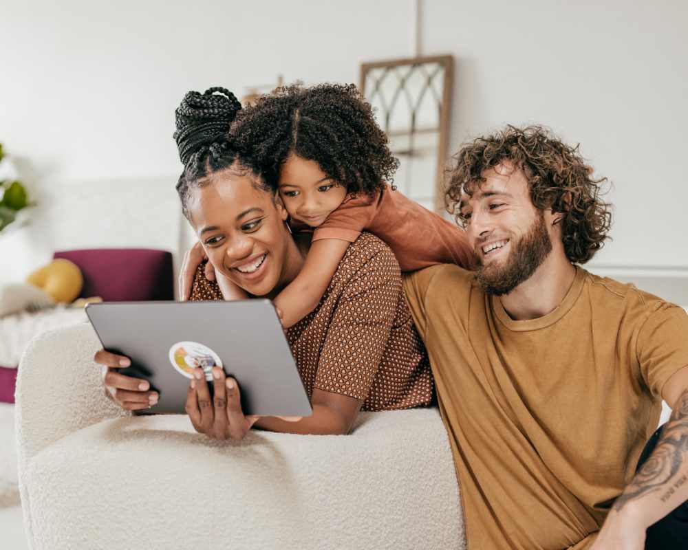 Happy resident family in the townhome at Canyon Townhomes in Phoenix, Arizona