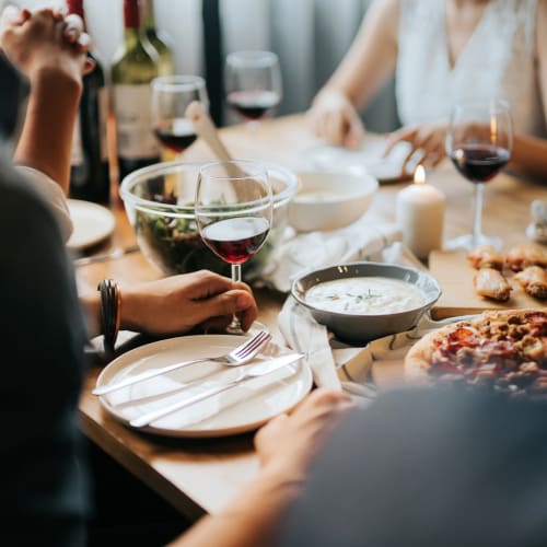 Residents sharing a meal at Cosmopolitan Apartments, Pittsburgh, Pennsylvania