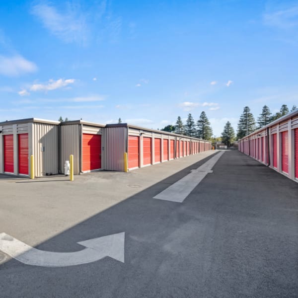 Outdoor storage units with bright doors at StorQuest Express Self Service Storage in Sacramento, California
