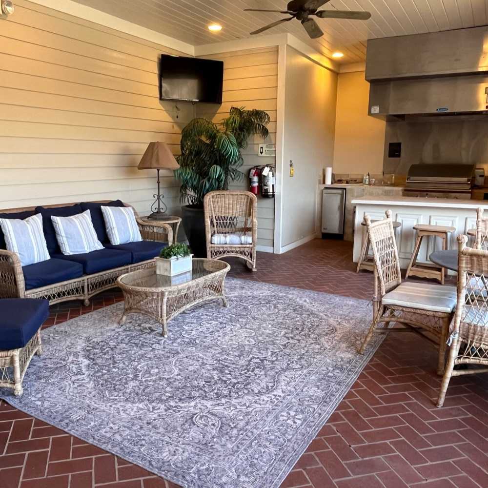 Community grilling station with seating provided for residents at Verandas at Mitylene in Montgomery, Alabama