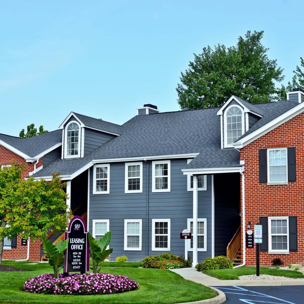 Apartment building and manicured landscape at Hunters Point in Zionsville, Indiana