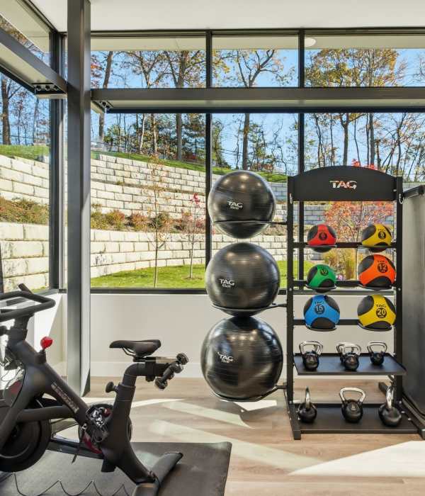 Fitness center and yoga studio at Eagle Rock Apartments at Woodbury in Woodbury, New York