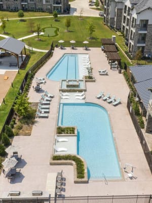 Aerial view of the resort-style swimming pools at Auberge of Tyler in Tyler, Texas