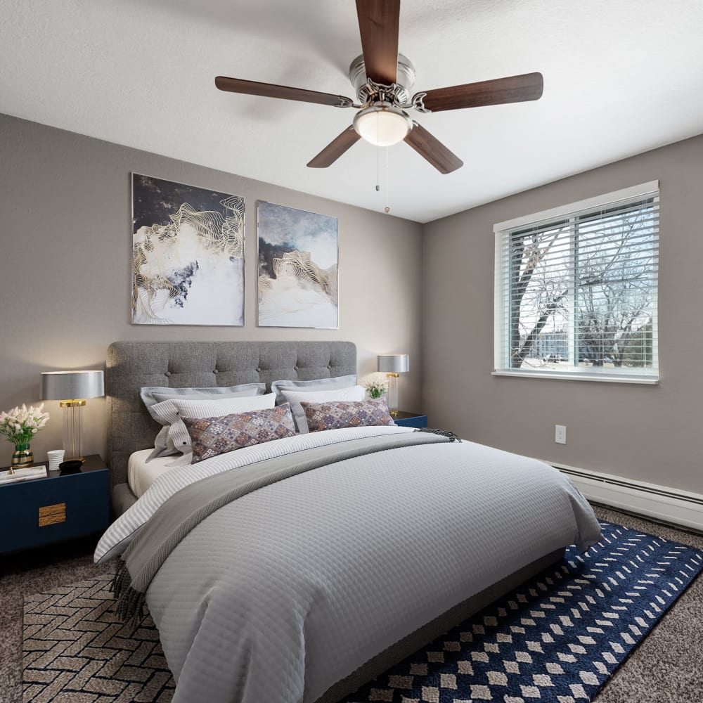 Bedroom with large window at Southglenn Place in Centennial, Colorado
