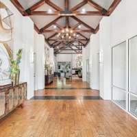 Hallway with luxury finishes at Asheville at Spring Branch in Houston, Texas