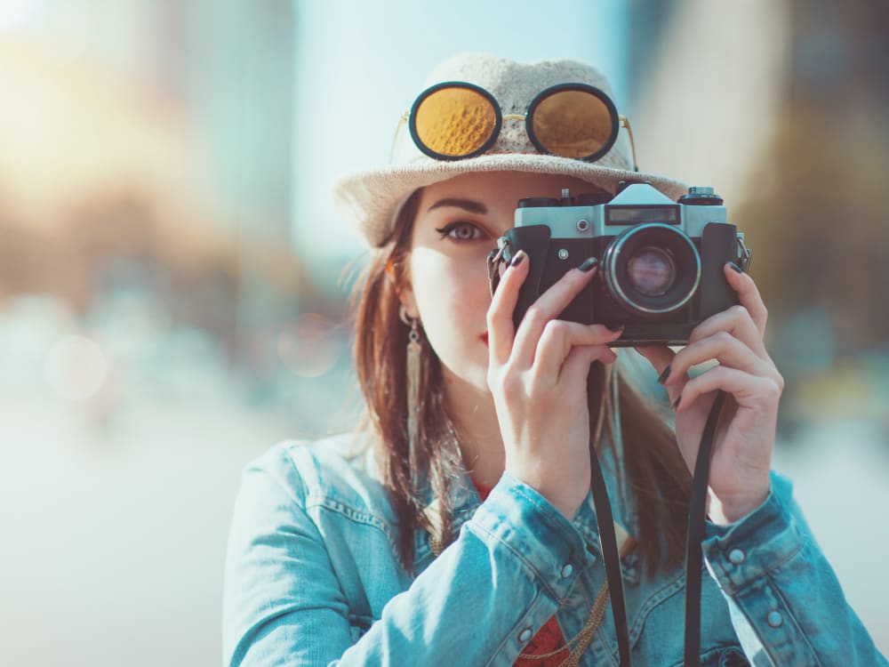 Resident taking photos near The Local Apartments in Tempe, Arizona