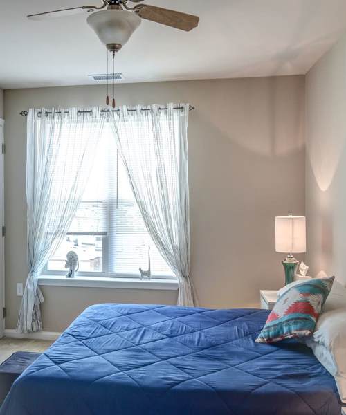 Well it bedroom with window at Viewmont Square in Hickory, North Carolina
