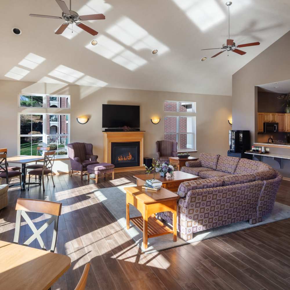 Spacious living with sofa and fireplace at LeSilve in Middleton, Wisconsin