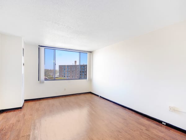 Living room with hardwood floors at Edgewood Commons