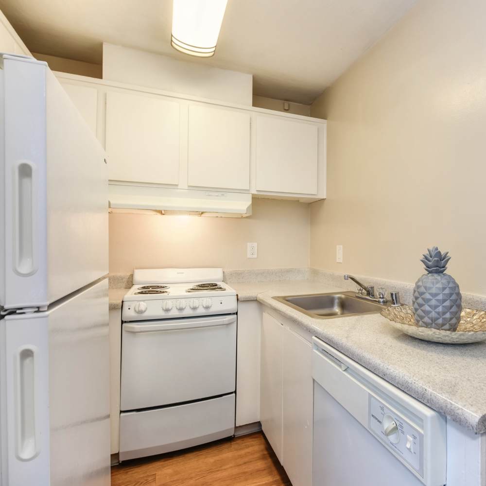 Kitchen with white cabinet at Glenwood Garden Apartments in Mountain View, California