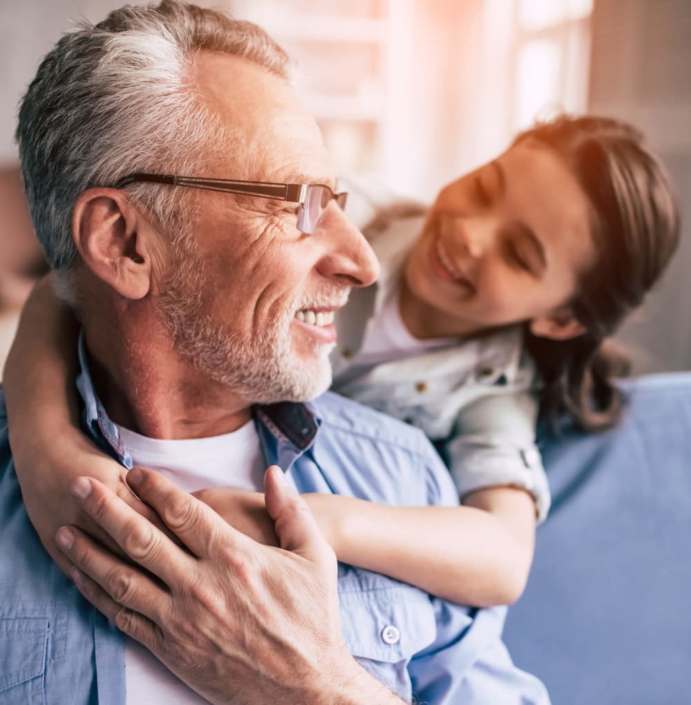 Resident spending time with a younger family member at Blossom Ridge in Oakland Charter Township, Michigan