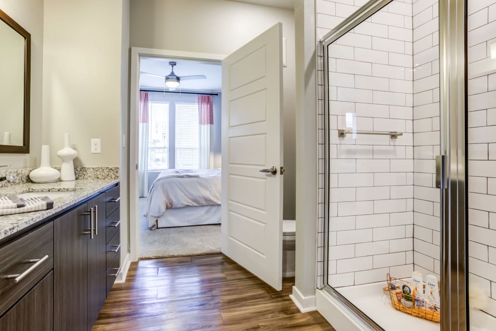 Bathroom with tiled shower enclosure at Town Commons in Gilbert, Arizona