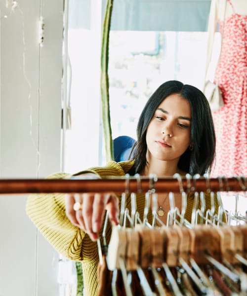 Resident shopping at a women's boutique near Sage at Cypress Cay in Lutz, Florida