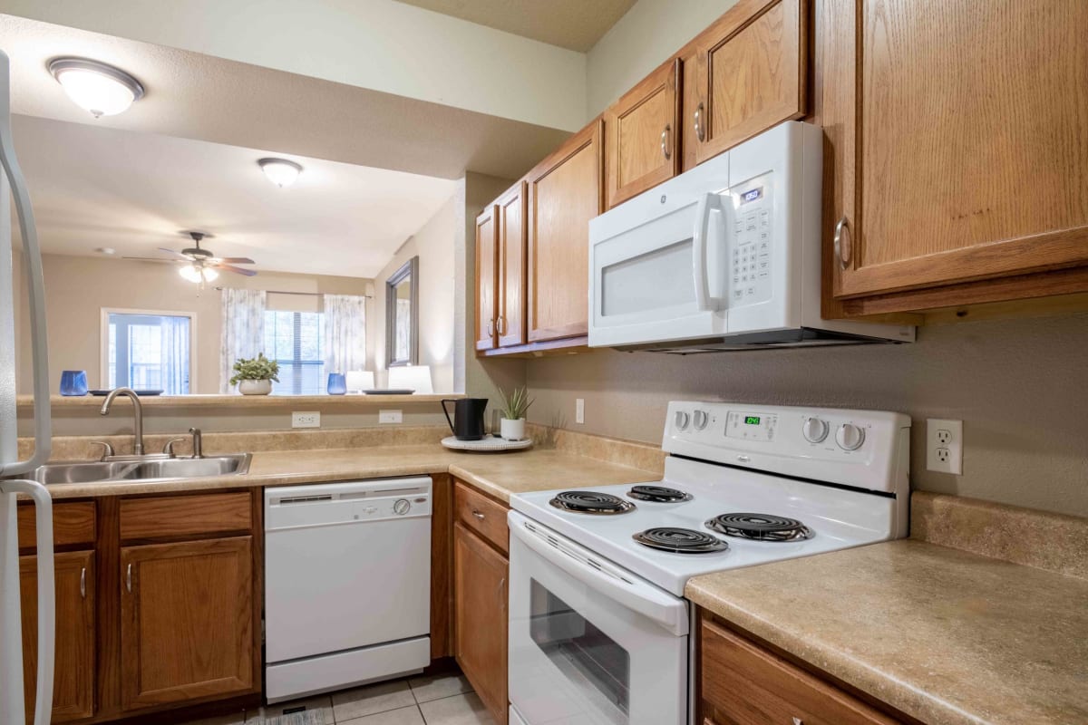 Apartment kitchen at Parc At Rogers in Rogers, Arkansas