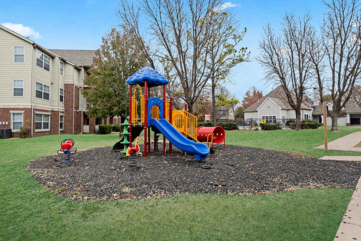 Community playground with slide at Garden Courtyards in Tulsa, Oklahoma