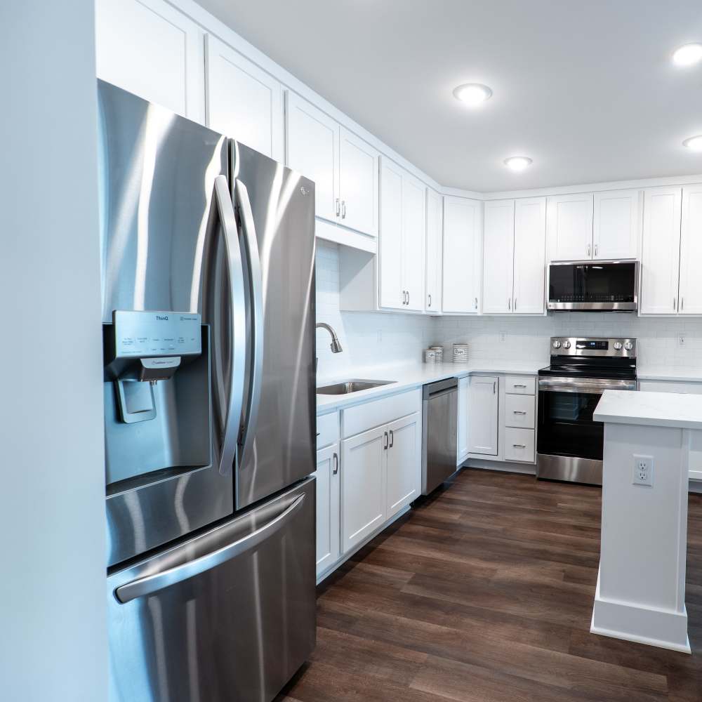 Kitchen with stainless-steel appliances at The Cove in Port St Lucie, Florida
